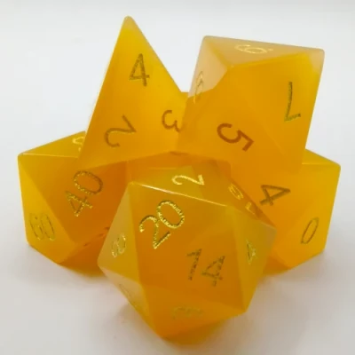 Semi-precious gems: yellow jade in a black metal box